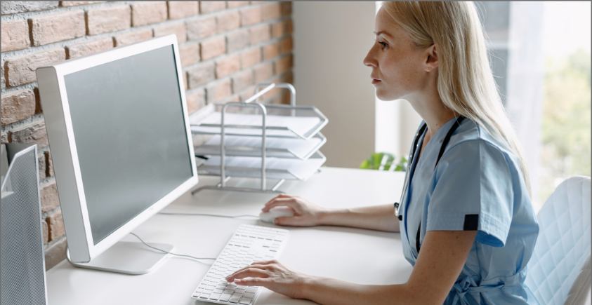 Physician using their computer