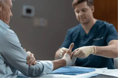 John Elway with Dr. Greyson