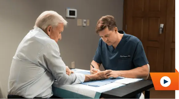 Watch John Elway with Dr. Greyson video